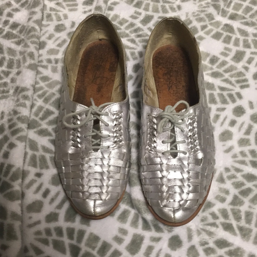 Silver woven shoes